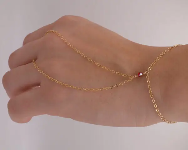 14k chain and Red Swarovski crystal hand chain. Custom and permanent jewelry in San Diego